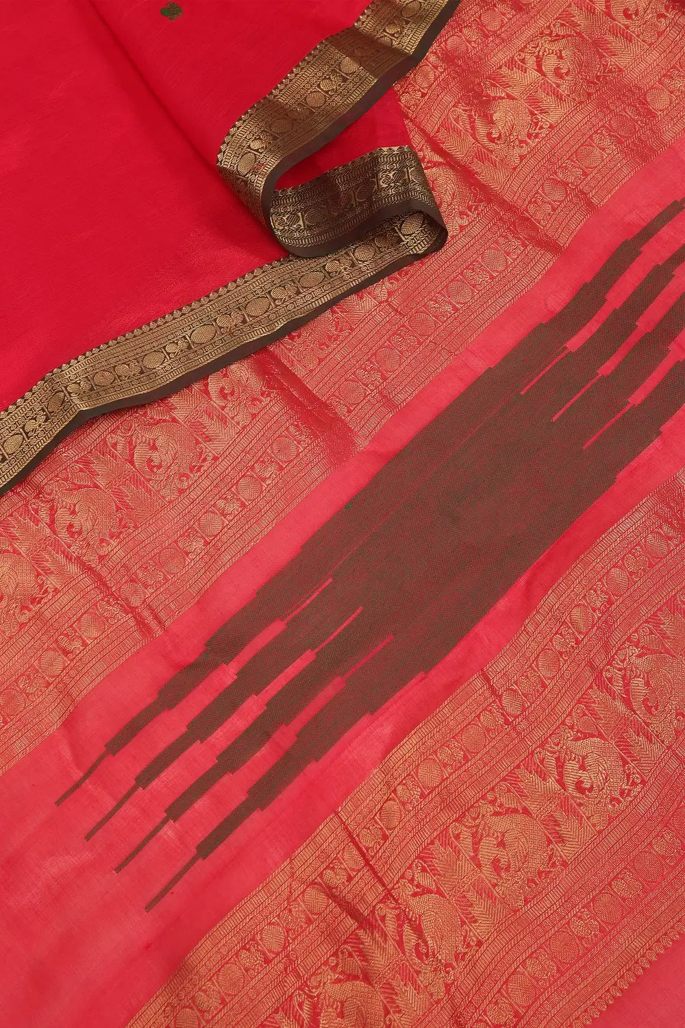 Neatly folded view highlighting the smooth texture and vibrant tone of the handloom silk cotton blend