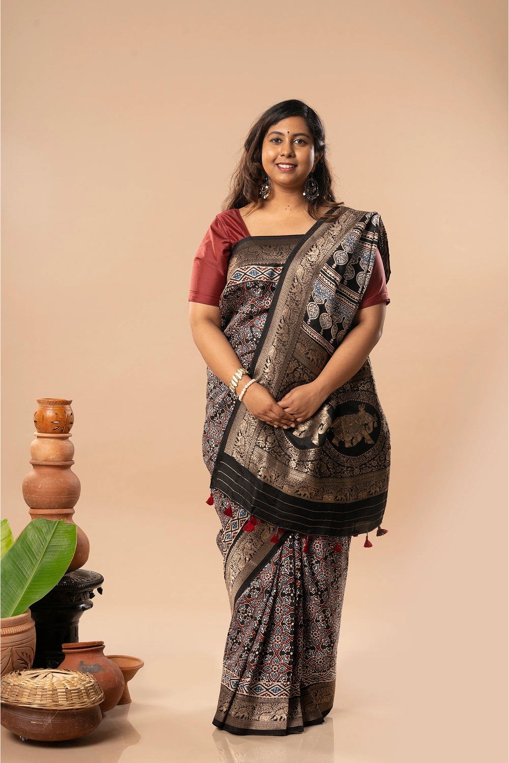 Regal Noir- Ajrakh Dola Saree