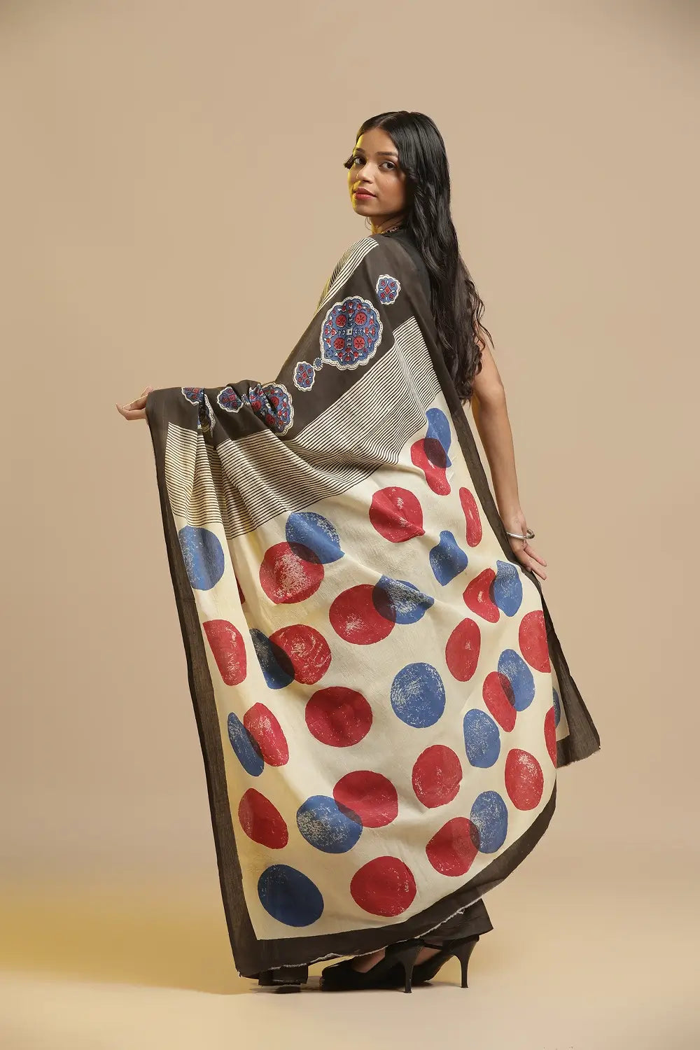 Full length view of the brown and beige Bagru cotton saree showcasing the traditional drape and styling