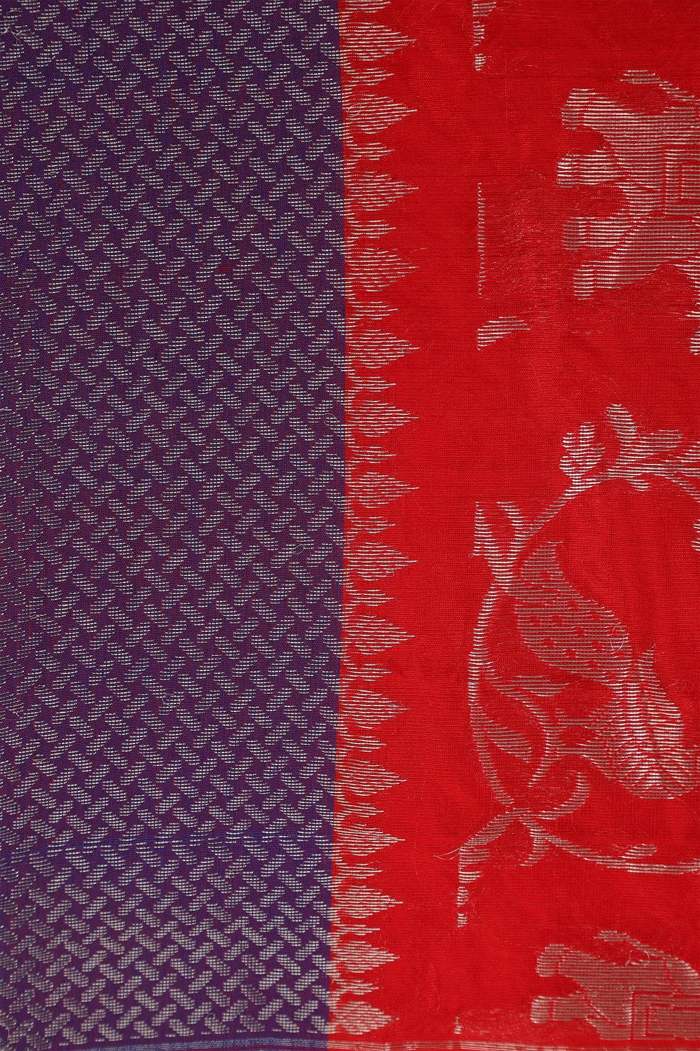 Flat-lay studio arrangement showcasing the contrasting blue border weave and silver zari patterns of the Chanderi pattu silk saree