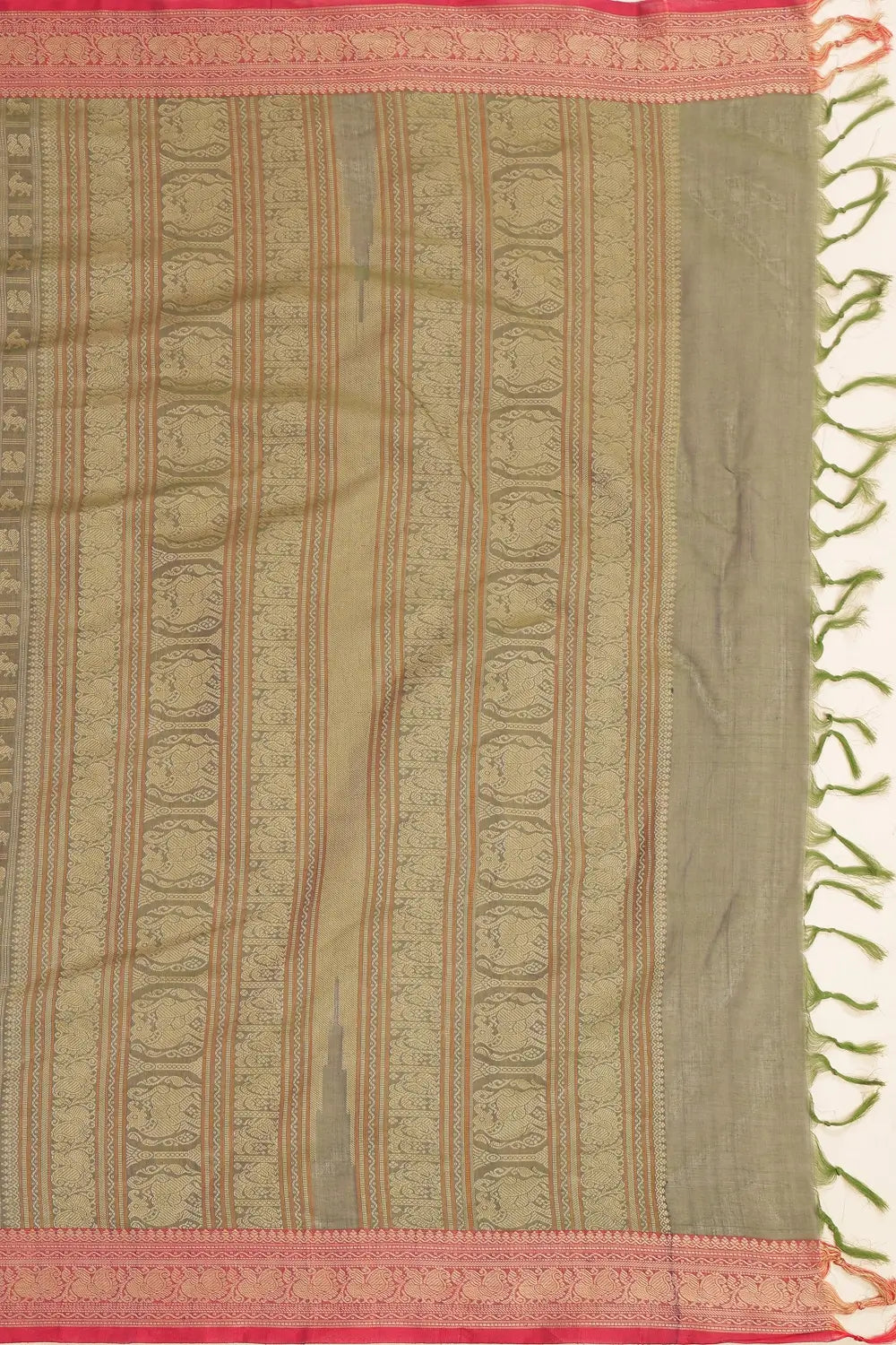 Folded view showcasing the smooth handloom cotton texture and rich border detailing
