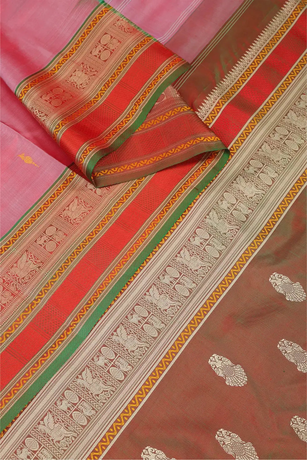 Detailed view of the Ganda Berunda motifs woven into the pallu of the Kanchipuram silk saree