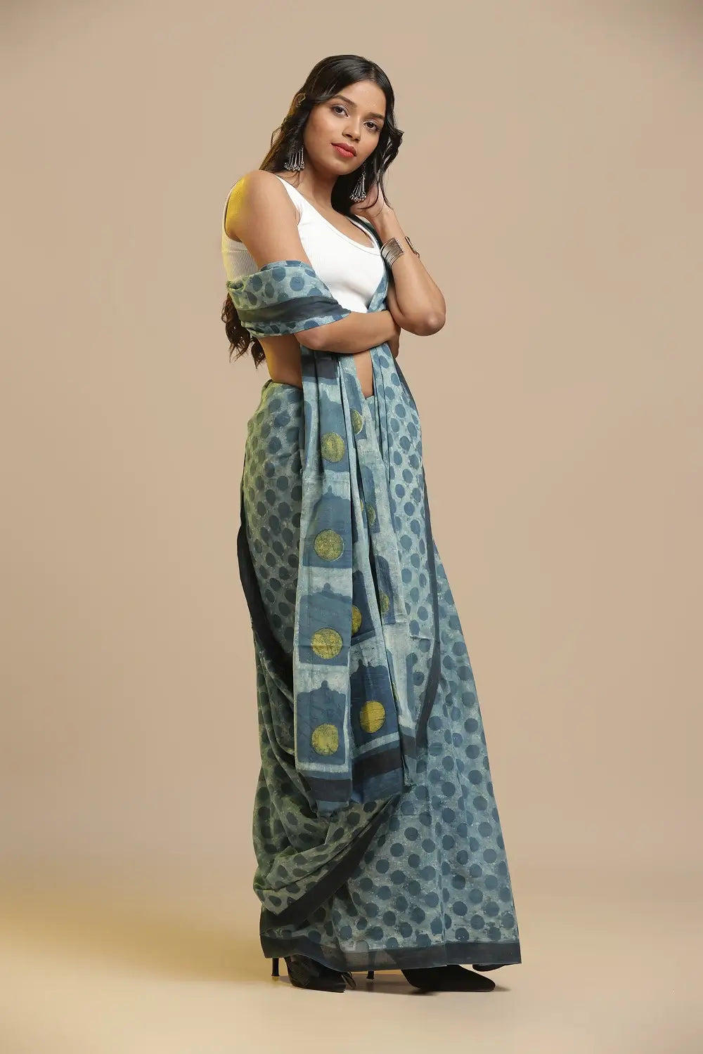 Full length view of the blue Bagru hand-block print cotton saree showing the traditional drape and styling