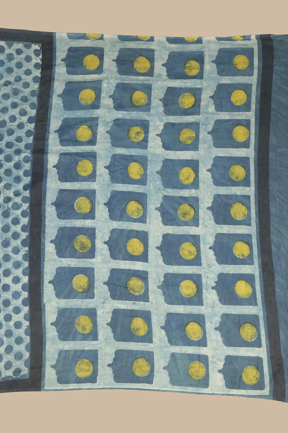 Detail view of the striking pallu highlighting intricate Jharokha patterns accented with a vibrant yellow sun motif