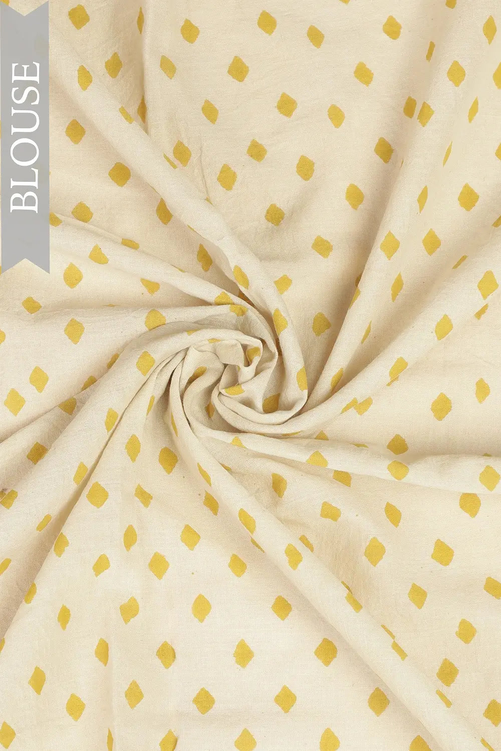 Unstitched beige blouse fabric with small yellow motifs designed to match the black handblock print saree