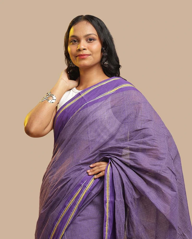 Close-up of the Royal Violet Udupi cotton saree showing fine handloom weave and gold stripe border details