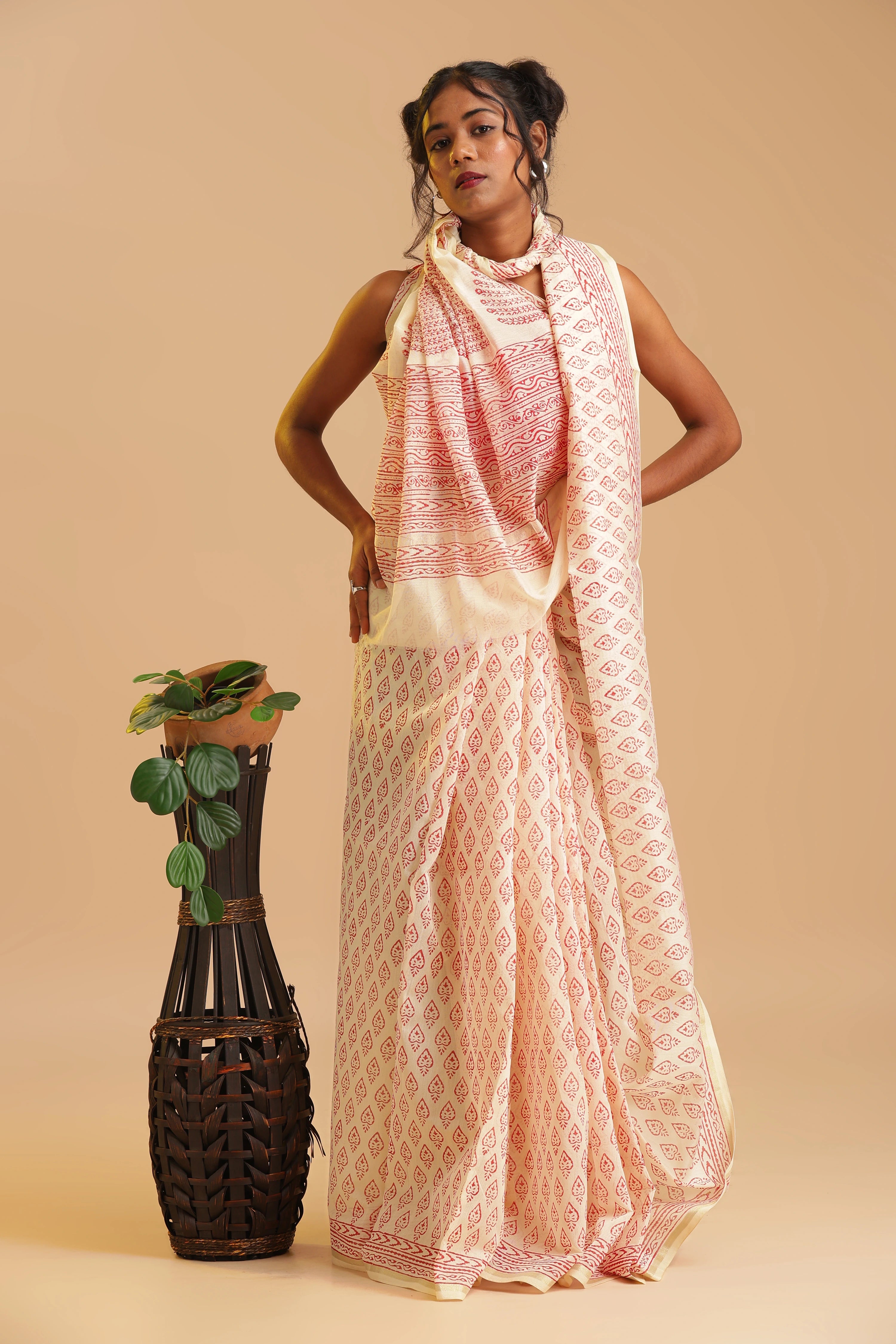 Front view studio posture showcasing the graceful drape and classic cream base of the Sindoor Reverie Chanderi cotton silk saree